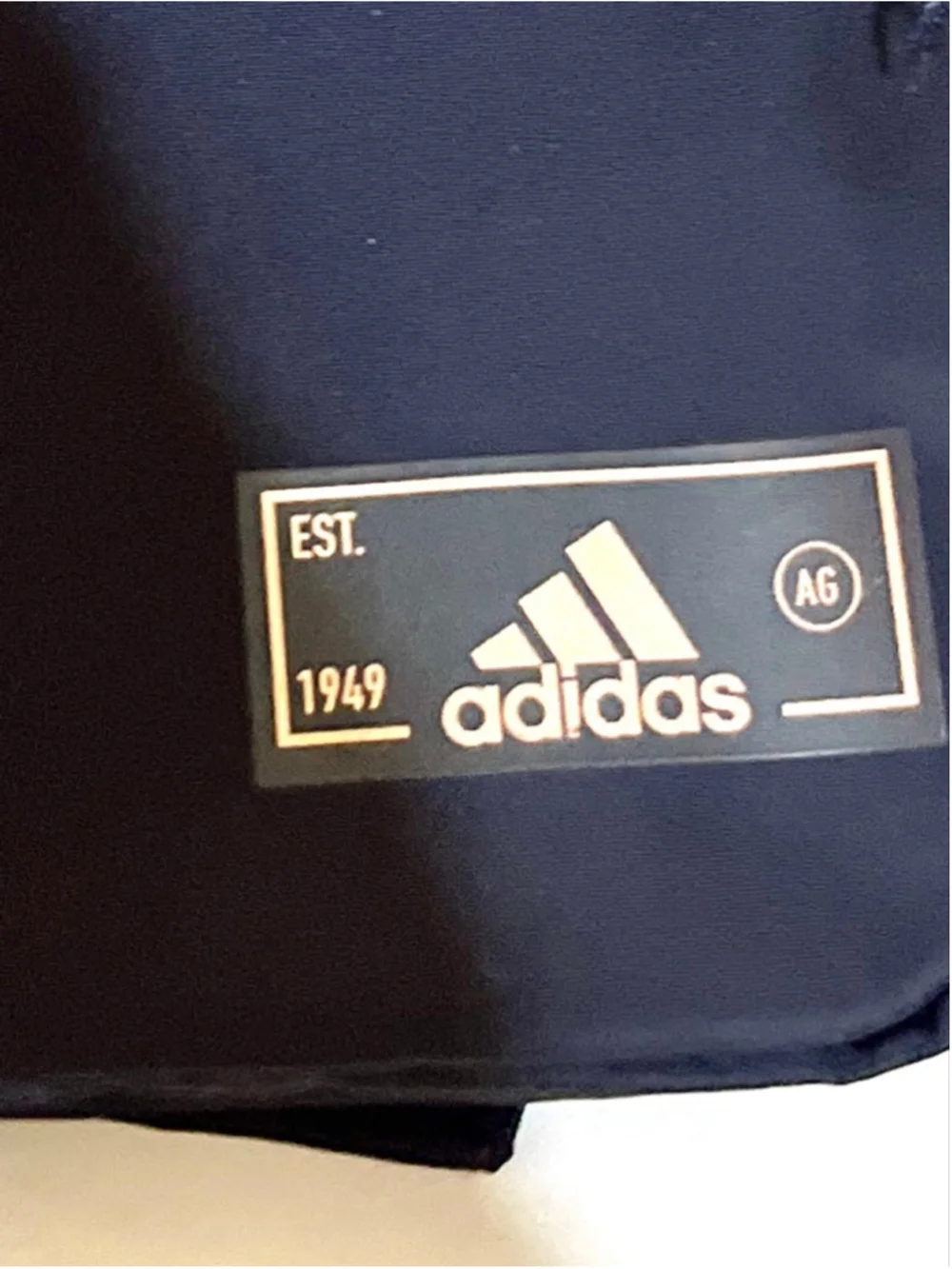 adidas Essentials 2 Sling Crossbody Bag in a Legend Ink blue color unisex